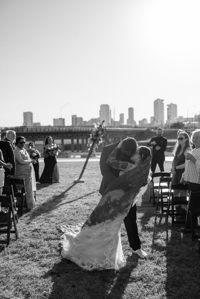 bride and groom first kiss 