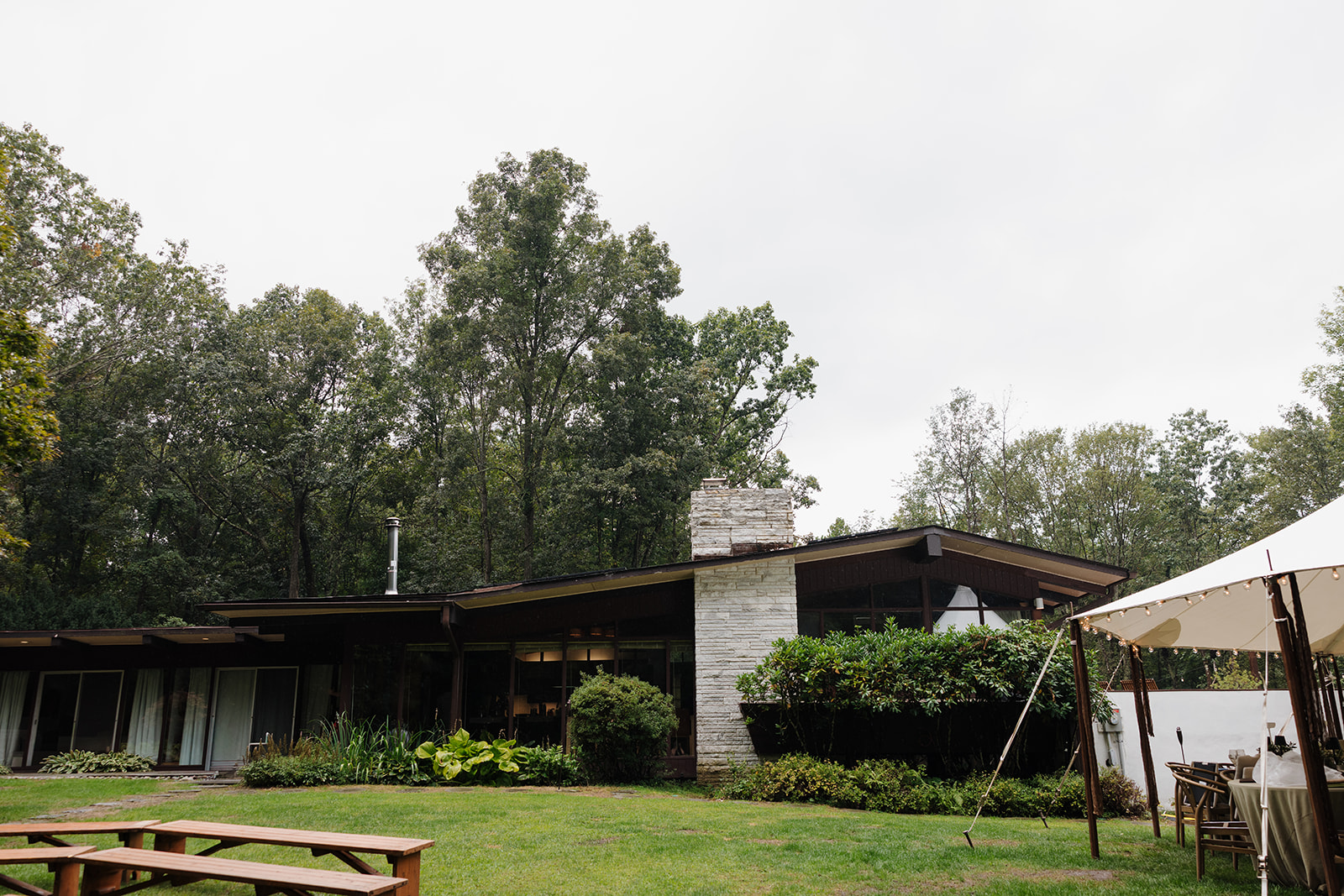 Exterior view of The Mod House showing the mid-century modern architecture nestled in the Catskills.