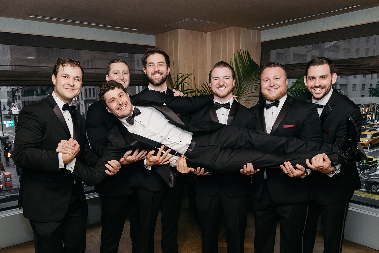 Groom and groomsmen photo pose