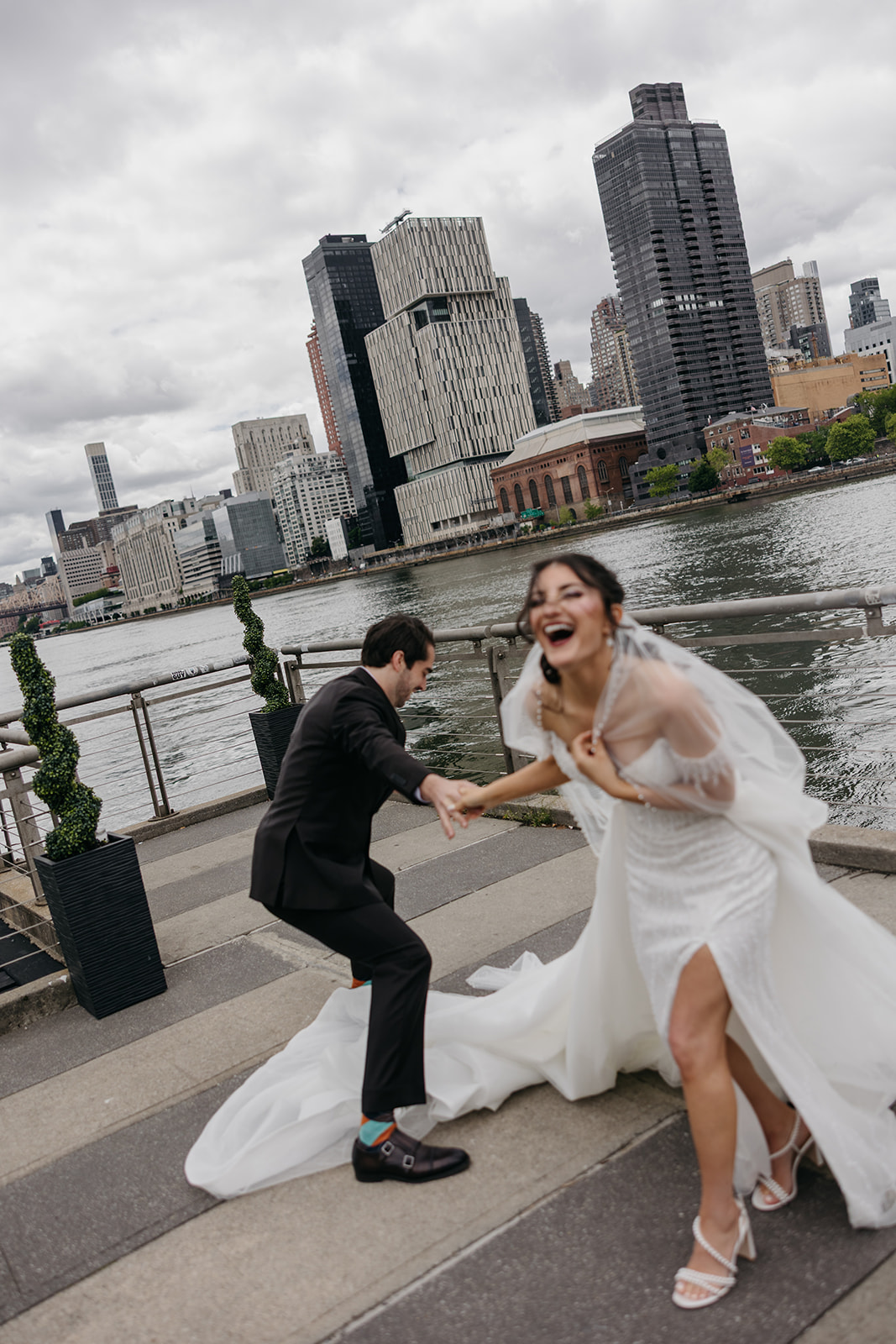 Playful bride and groom photo