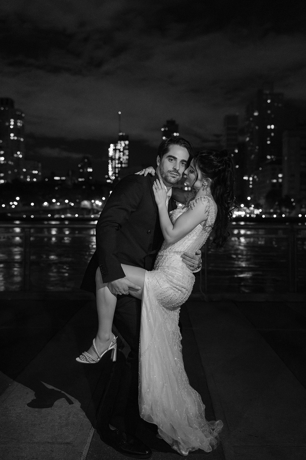 night photo of bride and groom