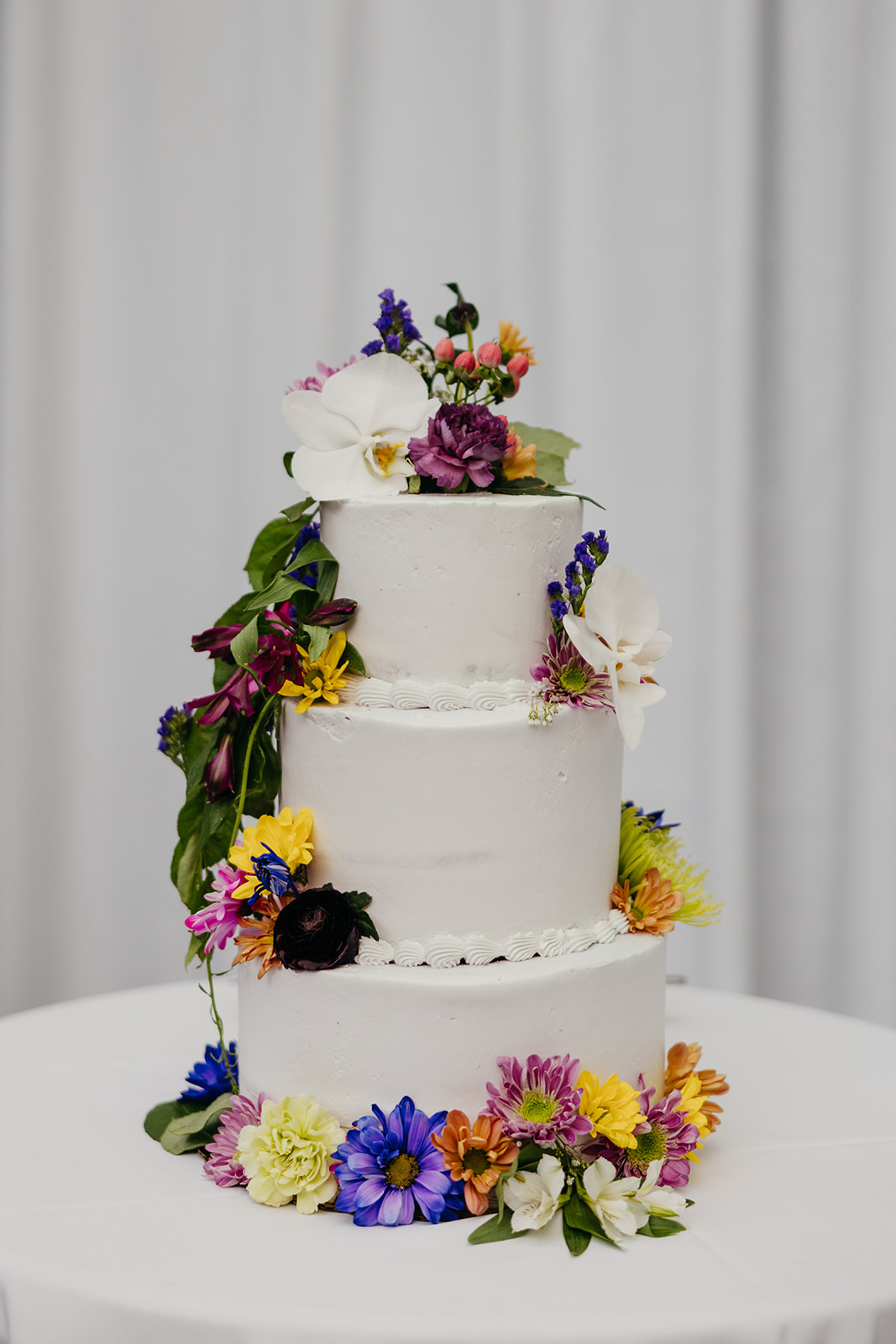 Colorful wedding cake inspiration at the roosevelt island sanctuary