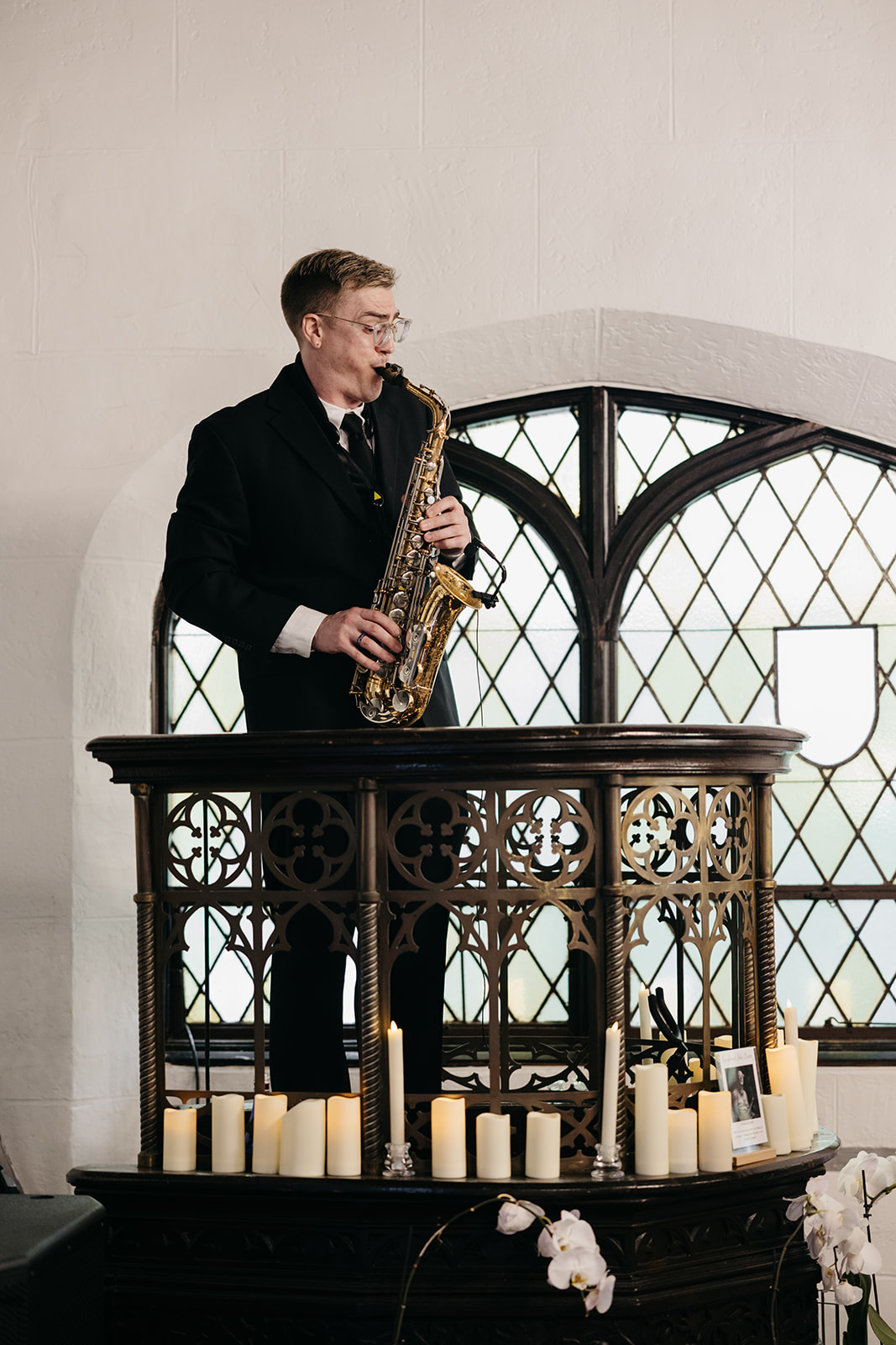 A saxophonist playing during cocktail at Roosevelt Island NYC