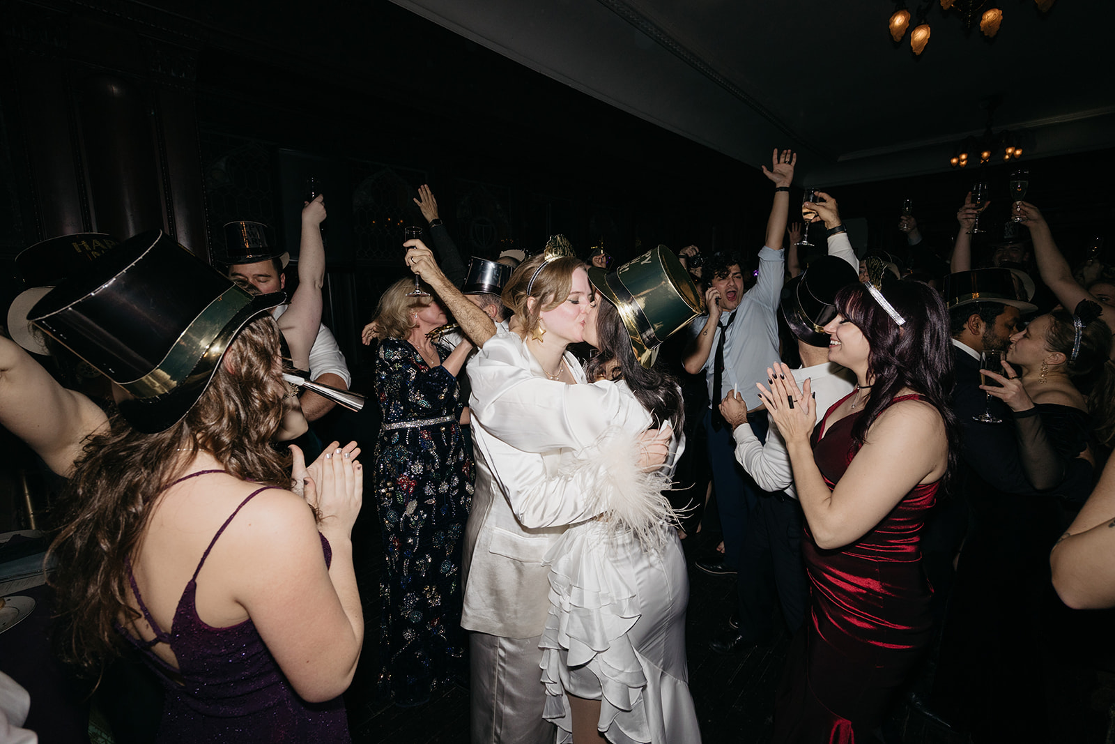 NYE wedding party with guests celebrating on dance floor at Montauk Club