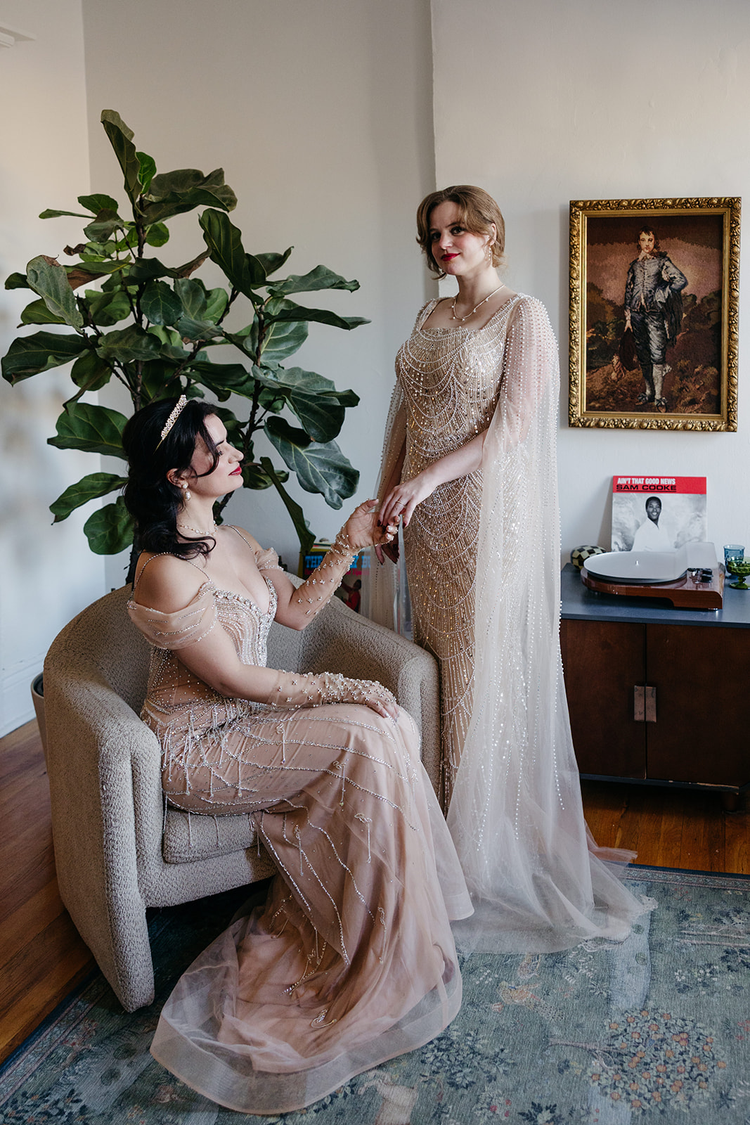Bride getting ready in Brooklyn apartment wearing vintage inspired beaded wedding dress