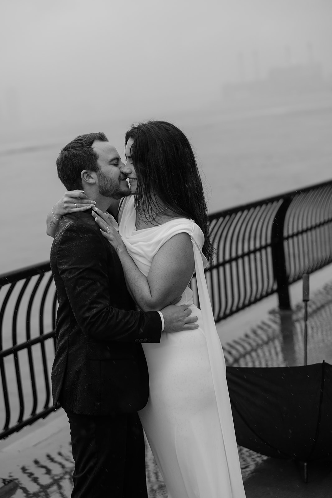 Documentary style rainy engagement photos in New York City